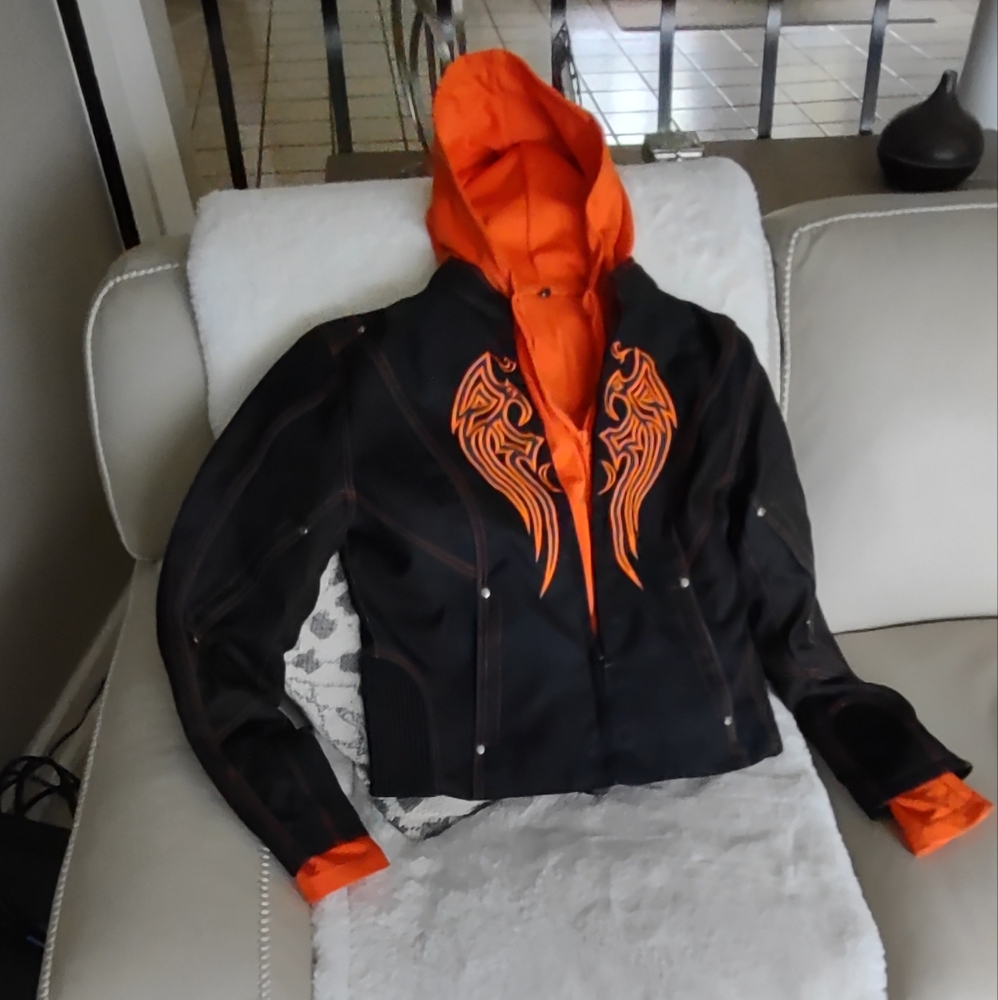 Women's textile motorcycle jacket with embroidered tribal deco. Size Large.